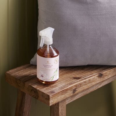 Thymes Magnolia Willow Wood Cleaning Spray on bench